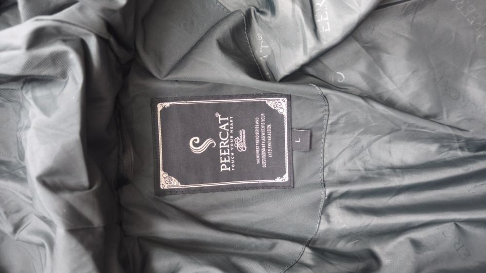 Пуховик жіночий .