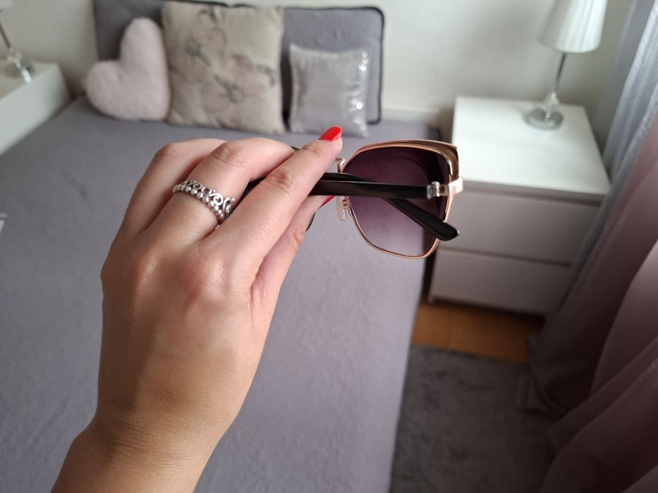 Óculos de sol, com uso mínimo