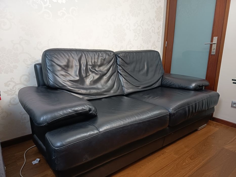 Sofá cama em pele