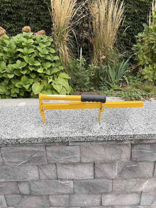 Захват для перенесення цегли, плитки, блоків