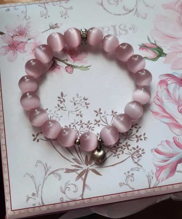 Różowa bransoletka z serduszkiem i cyroniami coquette