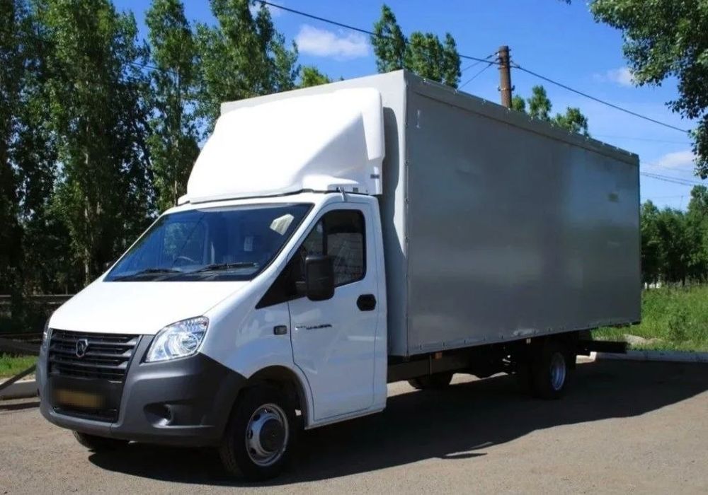 Грузовое такси по Киеву всей Украине Переезды грузчики перевозки квартирные мебели недорого грузовые перевозки газель
