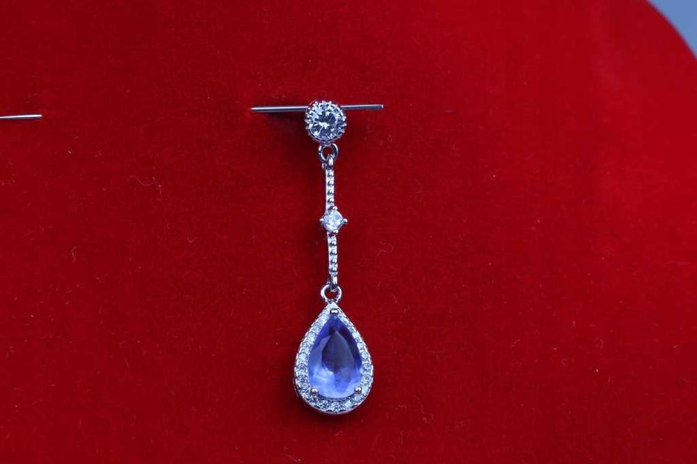 18) Rodowana zawieszka srebro pr.925 błękitne oczko