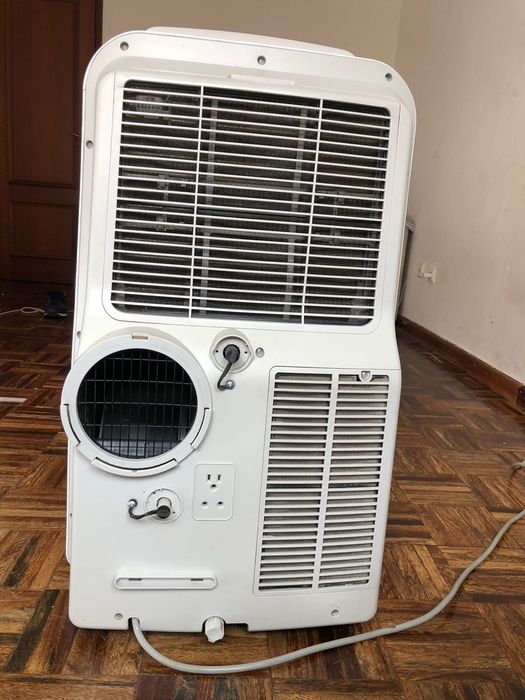 Ar condicionado e aquecedor (dupla funçâo)