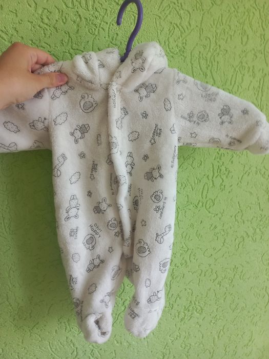 Дитячий чоловічок на мохрі