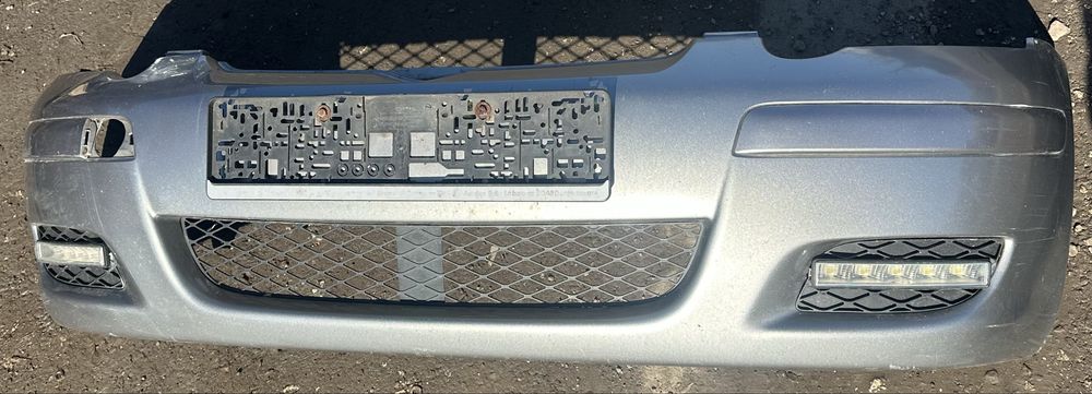 Бампер передній Toyota Yaris 2003 рестайл