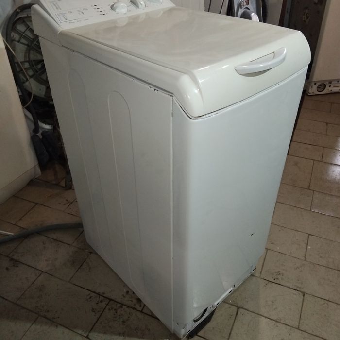 Вертикальная стиральная машина индезит.