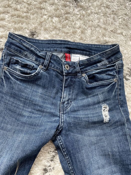 Jeansy ciemne rurki H&M divided dziury przetarcia S/36