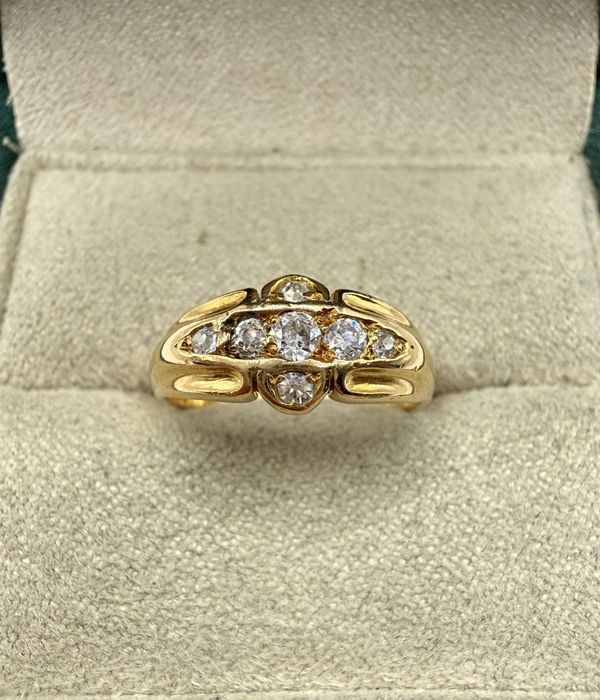 Złoty pierścionek 750 z diamentami 0,15ct