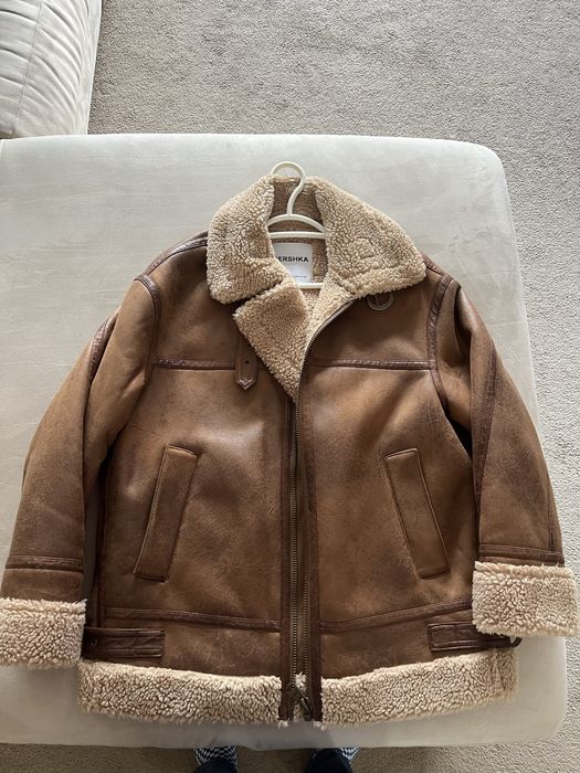 Casaco castanho pelo