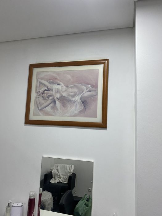 Quadro em muldura de madeira