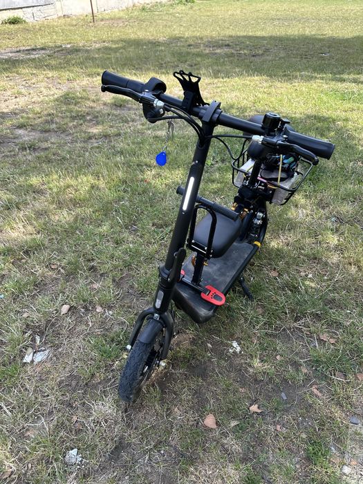 Електросамокат для їзди з дитиною