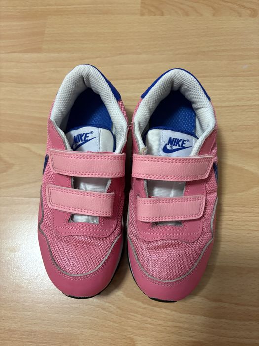 Кросівки Nike Sinsay та чоботи рожеві