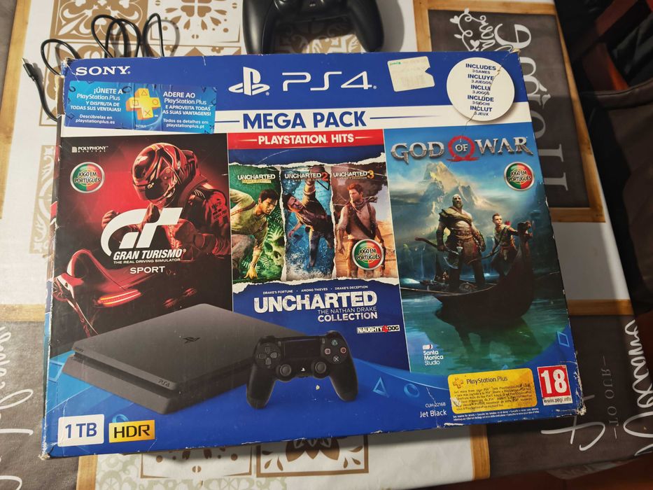 PS4 slim 1TB com dois jogos e TV 32 polegadas.