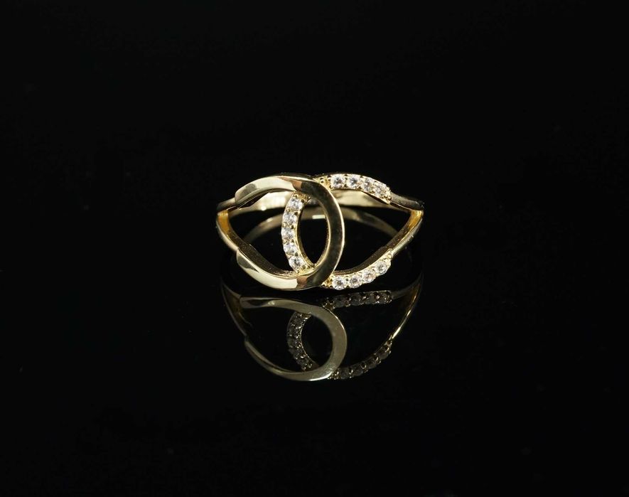 Złoto 585 - złoty pierścionek z cyrkoniami. Rozmiar 18