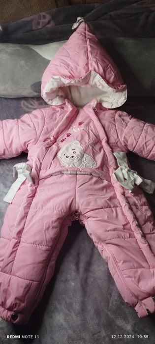 Продам зимові комбінезон та куртки для дівчаток.