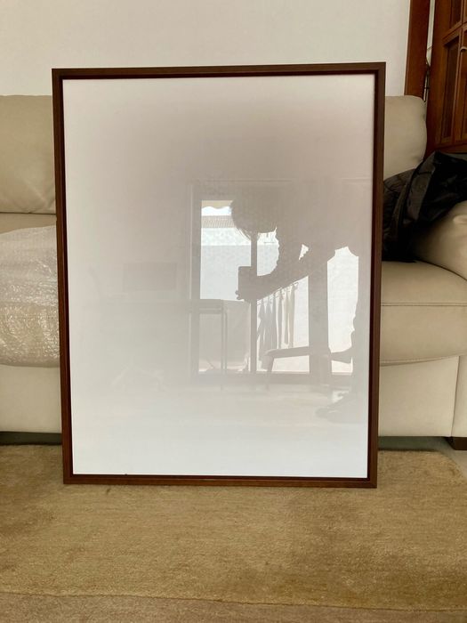 Molduras de madeira e vidro