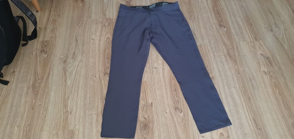 Eleganckie spodnie sportowe NIKE rozmiar M do golfa i inny sportów