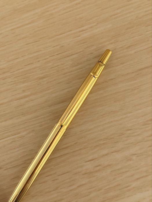 Позолочена ручка Caran d'Ache