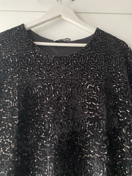 Elegancka sukienka cekinowa