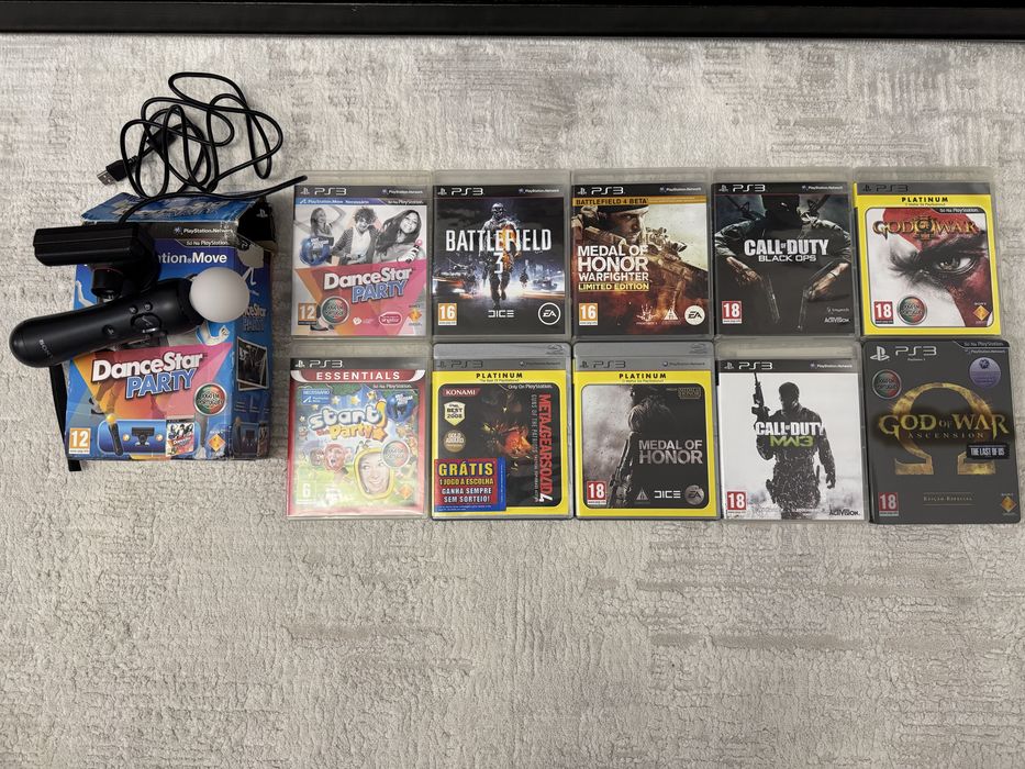 Ps3 com comandos, camera e 10 jogos
