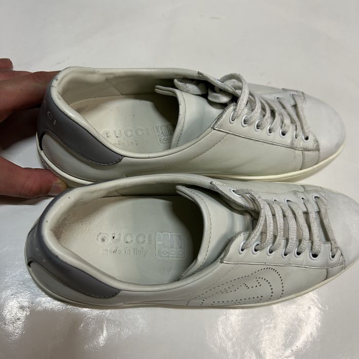Białe skórzane sneakersy Gucci Ace Interlocking G