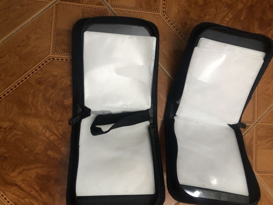 Porta CDs DVDs c/ novo