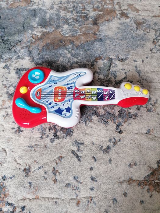 Zabawka interaktywna CHICCO Happy Music Gitara - stan idealny