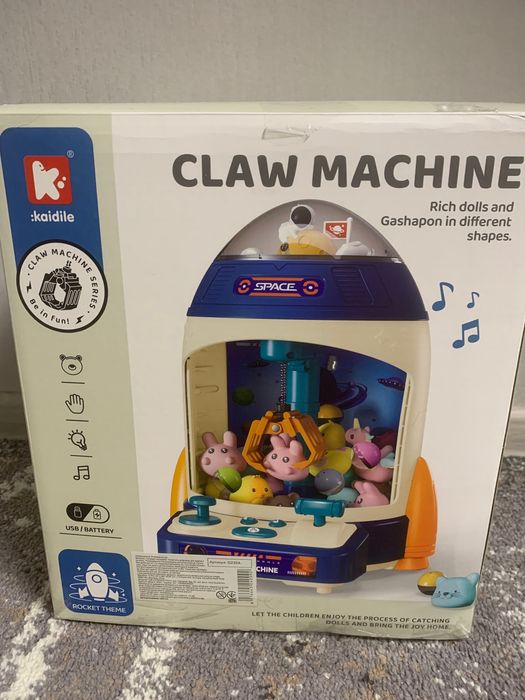 Іграшковий автомат хватайка