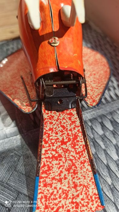 Детская механическая игрушка птица.