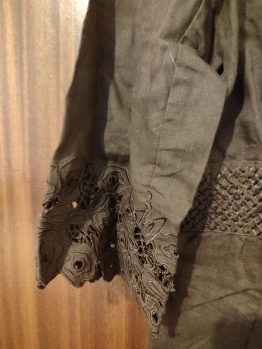 Blusas em segunda mão