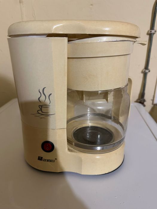 Máquina de café com filtros