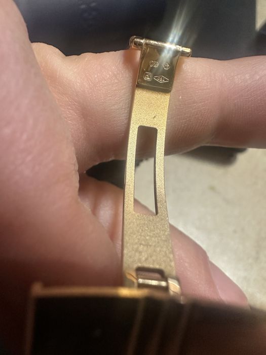 Золотые часы CORUM