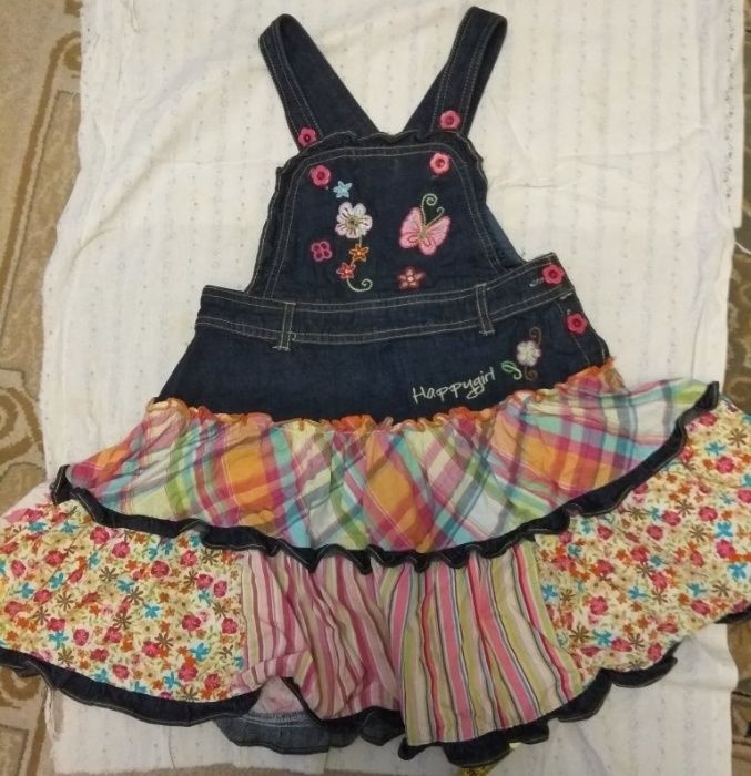 Продам джинсовый сарафан на  девочку 5 лет.
