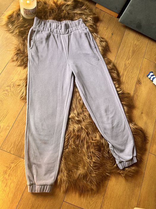 Jasnofioletowe dresy spodnie damskie r.XS 4F