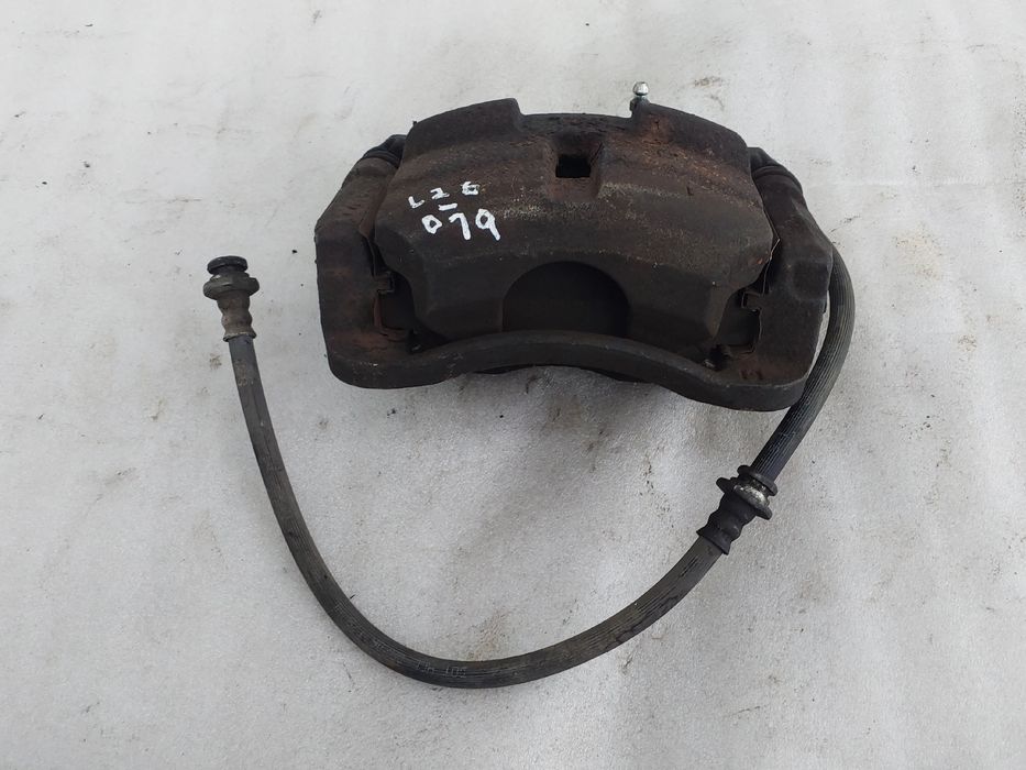 Pinça travão / maxila de travão frente esquerda NISSAN Qashqai/Qashqai