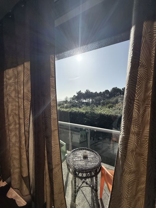 Suite com varanda vista de mar