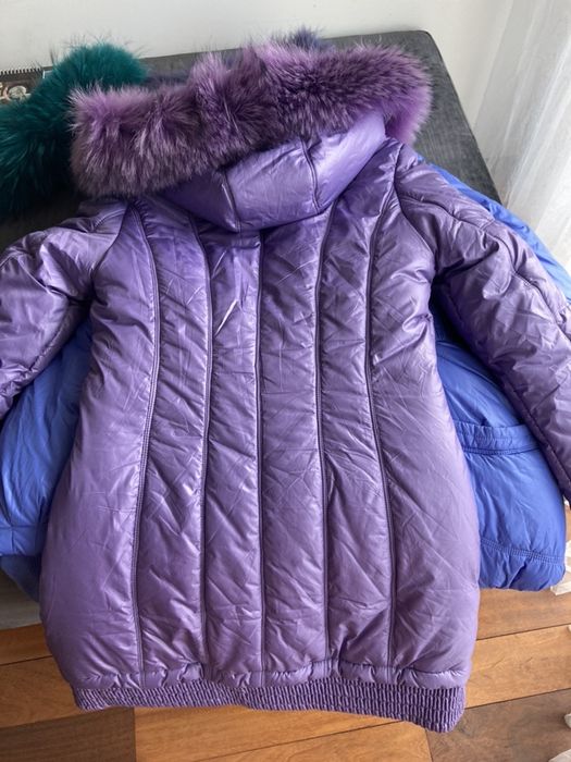 Casaco de penas quente