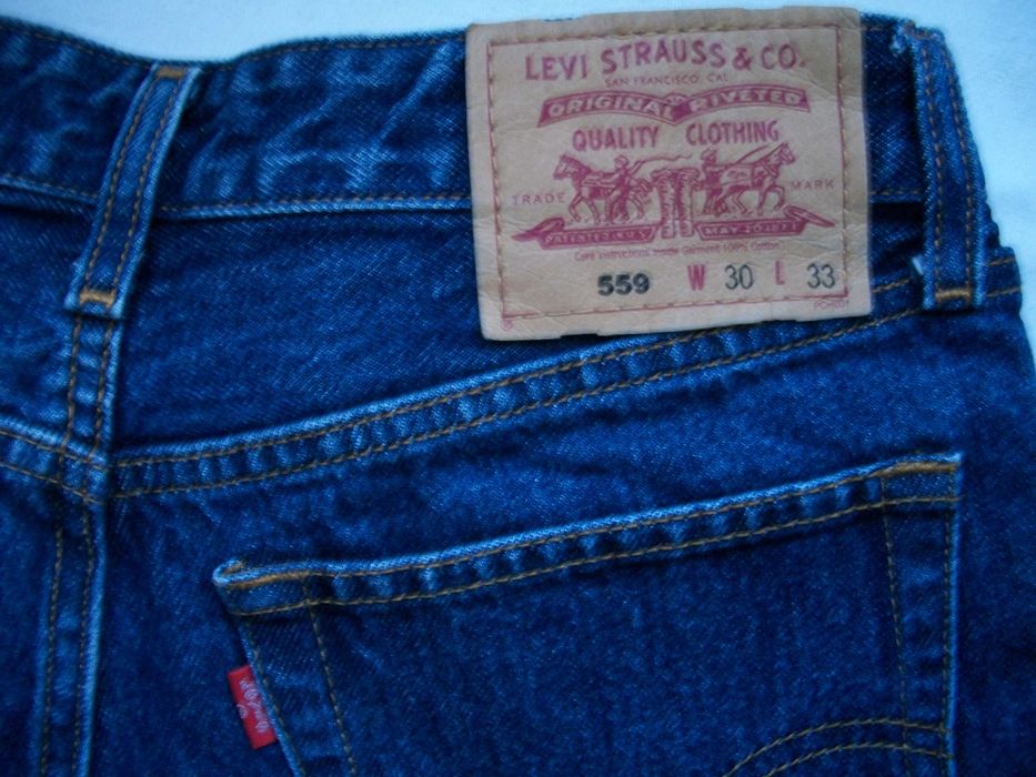винтажные расклешенные женские джинсы Levis 559 полут.37-38 см