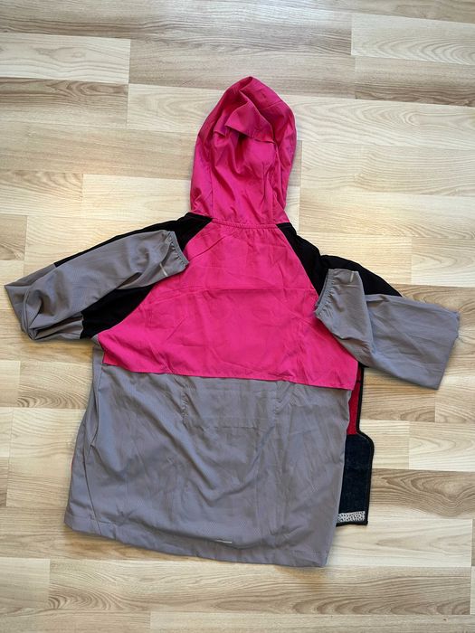 Komplet Nike Running Dri-FIT w rozmiarze L – kurtka + koszulka + spodenki.