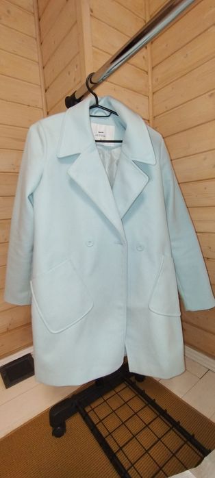 Пальто блакитного кольору