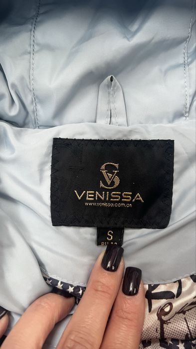 Продам пуховик жіночий