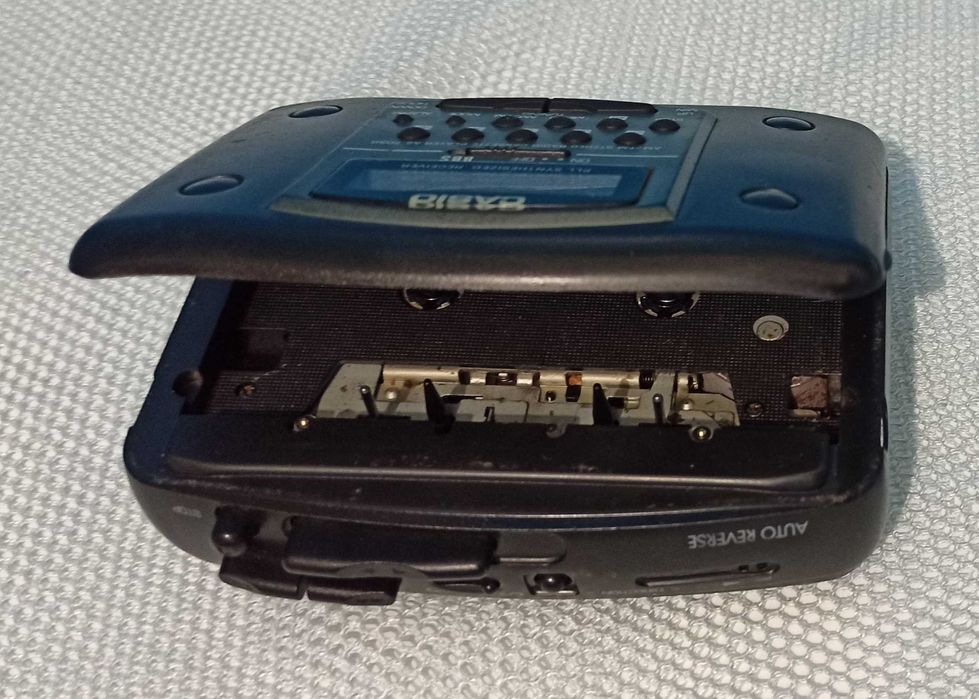 Кассетный плеер CASIO AS-703R комплект  с наушниками