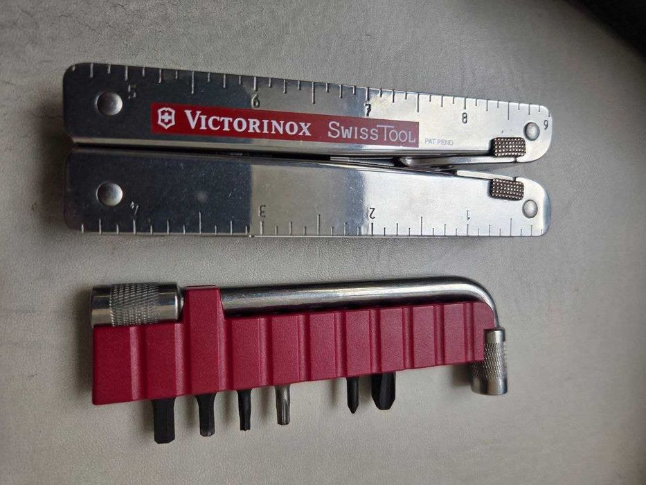 Victorinox SwissTool Plus – multitool, stan idealny, jak nowy