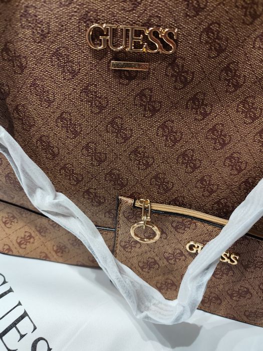 Malote Guess camel tem porta moedas incluído,saco de pó é magnífica