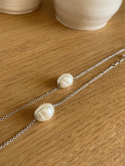 Pulseira prateada com perola