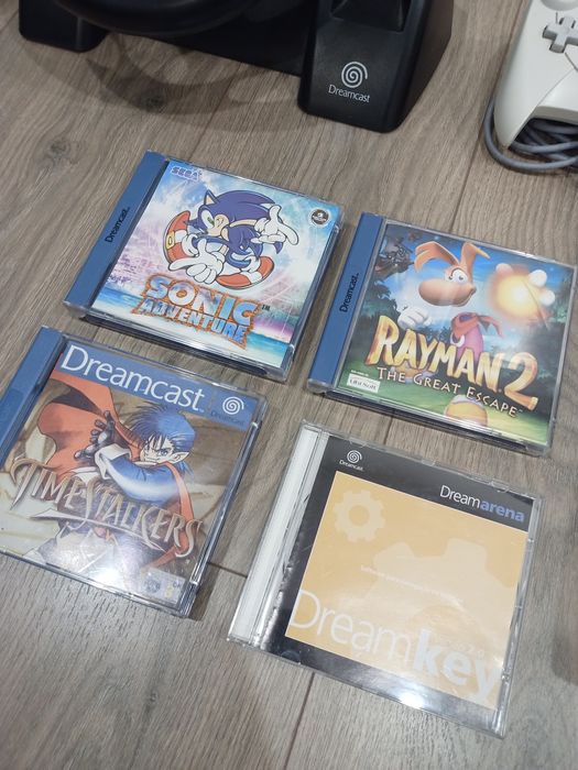 Dreamcast + jogos + 2 comandos + 2 VMU + volante