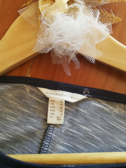 Blusa azul com borboletas