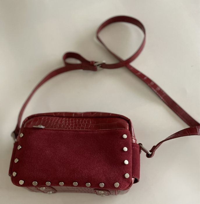 Carteira ou mala com tiracolo de senhora