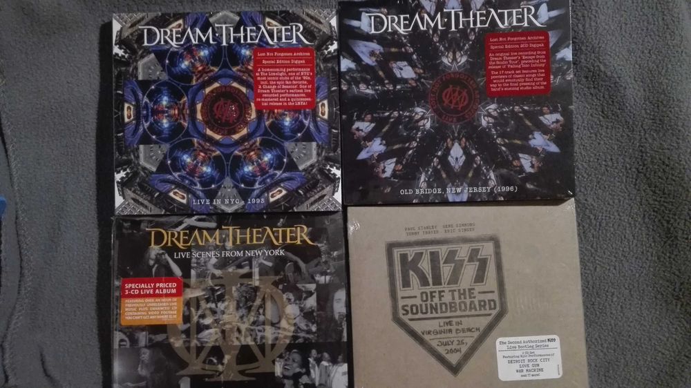 CDs selados dos Dream Theater e KISS